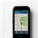 A handheld GPS device displaying a map and coordinates.